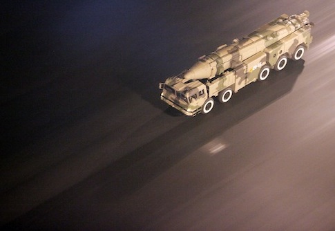 A missile launcher drives down a street in Beijing, China / AP