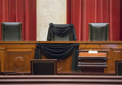 Supreme Court Justice Antonin Scalia’s courtroom chair is draped in black to mark his death / AP