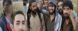 Ako Abdulrahman, center, saved dozens in Iraq with armored BMW / Screenshot from YouTube