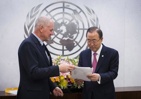 Ake Sellstrom (L), Head of the United Nations Mission to Investigate Allegations of the Use of Chemical Weapons in the Syrian Arab Republic, hands his report over to Secretary-General of the United Nations, Ban Ki-moon at the United Nations headquarters in New York December 12, 2013. Chemical weapons were likely used in five out of seven attacks investigated by U.N. experts in Syria, where a 2-1/2-year civil war has killed over 100,000 people, according to the U.N. report published on Thursday.
