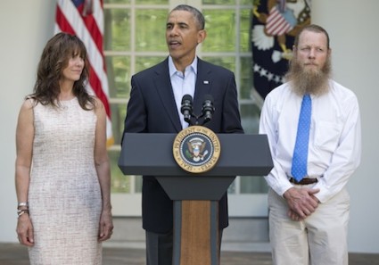 President Barack Obama, accompanied by Jani Bergdahl, left, and Bob Bergdahl, speaks during a news conference in the Rose Garden of the White House in Washington on Saturday