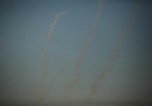 Smoke trails are seen as rockets are launched from the Gaza Strip towards Israel on August 20