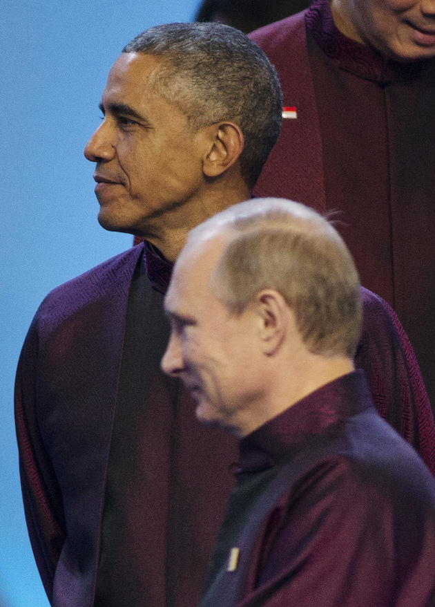 Obama avoids eye contact with Russian "president" Vladimir Putin. (AP)