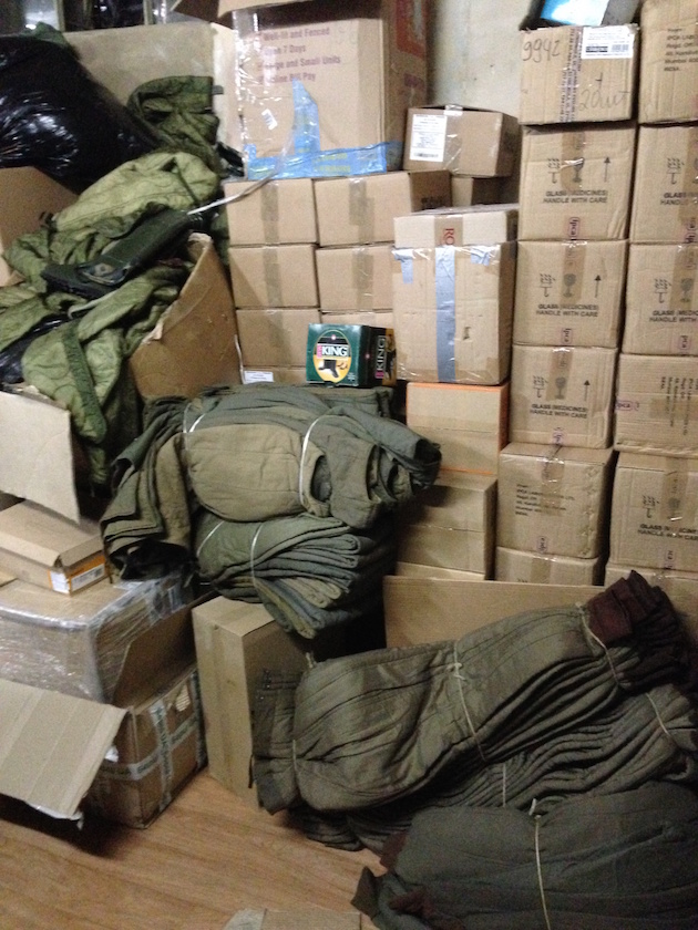 Supplies are stored at a volunteer-run supply depot before heading to the front lines.