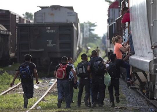 Immigrants journey toward U.S.-Mexico border