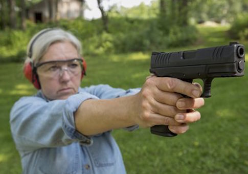 Old woman with a gun