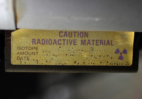 A sign indicating radioactive material is shown in Anaheim, California March 17, 2011.