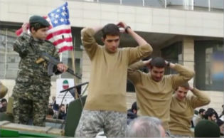 Iranians recreate the capture of U.S. sailors during a parade in Tehran