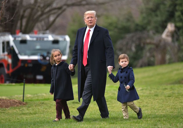 US President Donald Trump makes his way to board Marine One with grandchildren Arabella Kushner and Joseph Kushner