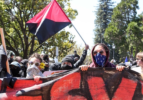 Antifa members and counter protesters gather during a rightwing No-To-Marxism rally in Berkeley, California