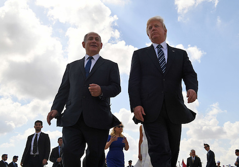 Israeli Prime Minister Benjamin Netanyahu speaks with President Donald Trump in Tel Aviv on May 23