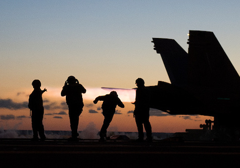 An F/A-18 Hornet takes off from the deck of the USS George H.W. Bush in the Atlantic ocean