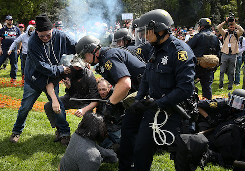 Police intervene as Trump supporters clash with protesters at a free speech rally in Berkeley, California