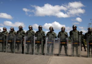 Venezuelan National guards block the road at the border between Venezuela and Brazil