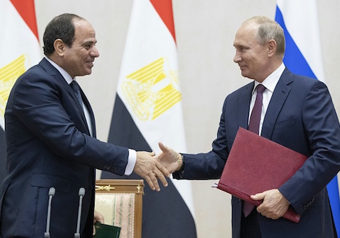 Russian President Vladimir Putin shakes hands with Egyptian President Abdel Fattah el-Sisi