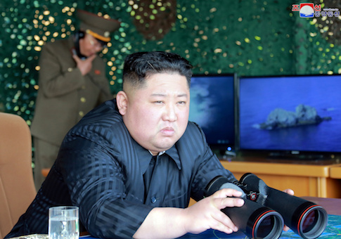 North Korea's leader Kim Jong Un supervises a 'strike drill'